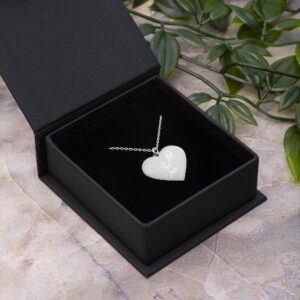 A flower Engraved Silver Heart Necklace