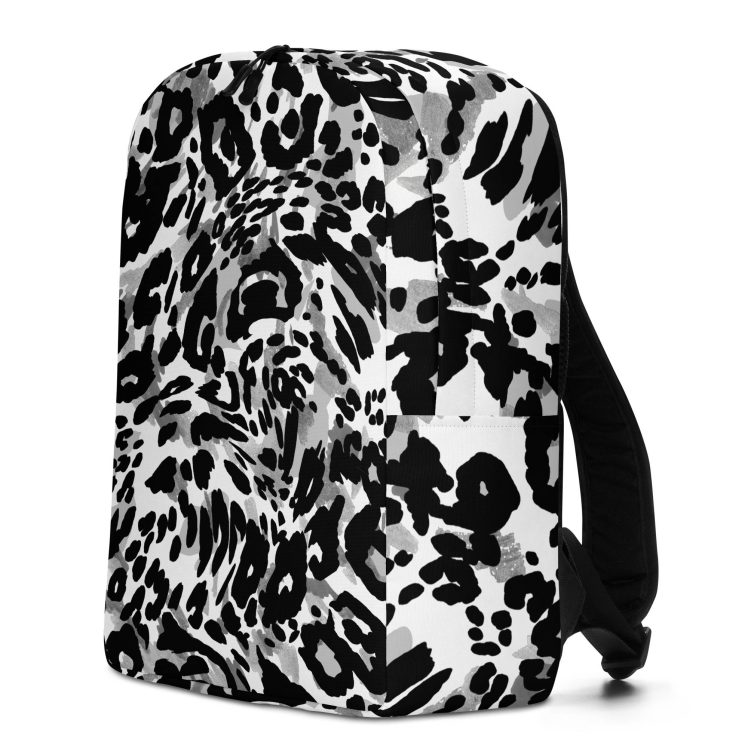 all-over-print-minimalist-backpack-white-left-63f91fec11fd0.jpg